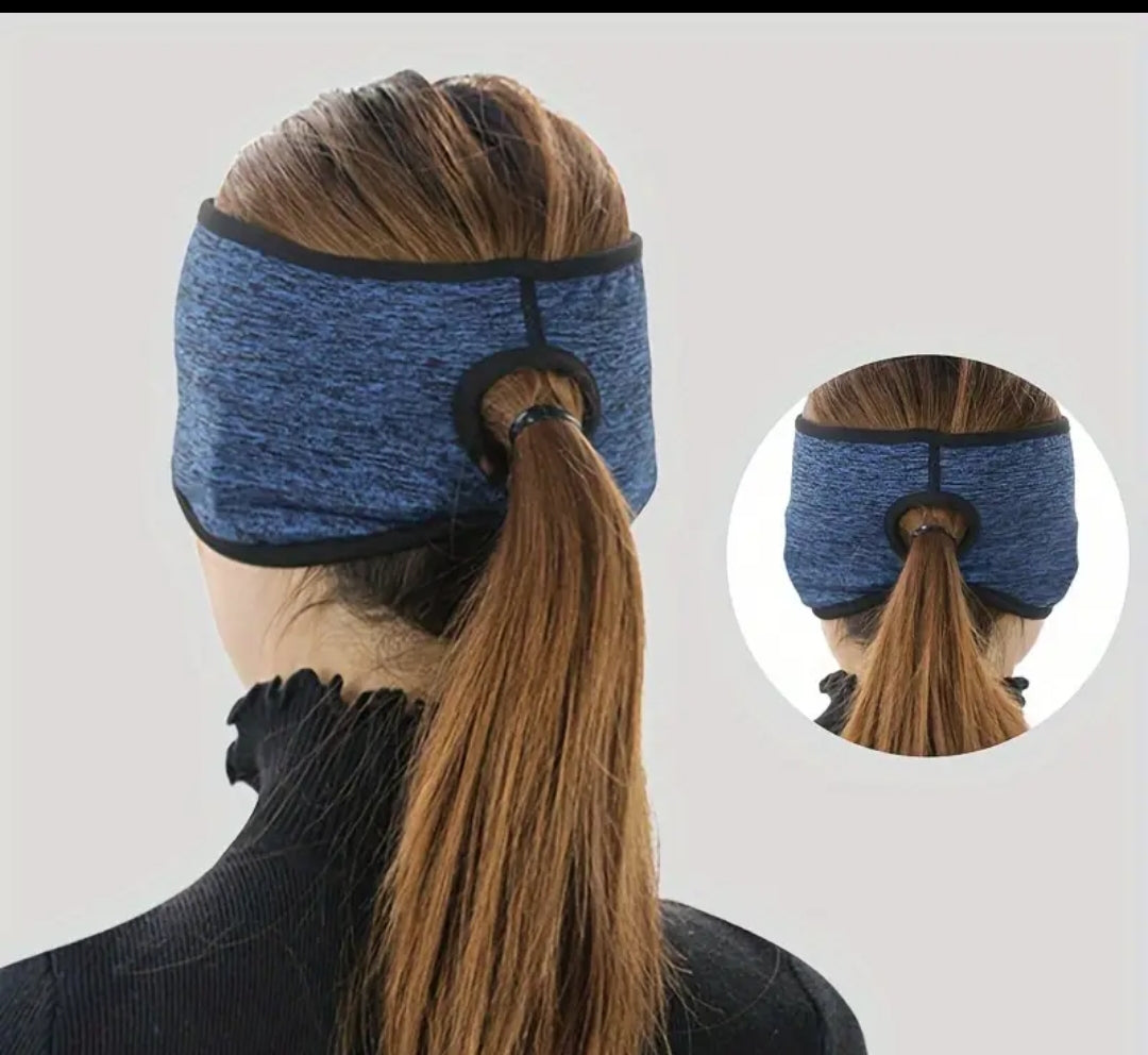 Ear warmer with pony tail hole