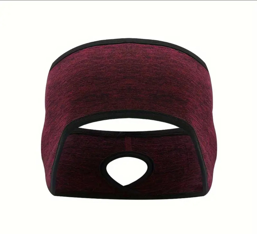 Ear warmer with pony tail hole